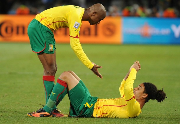 Benoît Assou-Ekotto consoling a team-mate after Cameroon's elimination at the 2010 FIFA World Cup